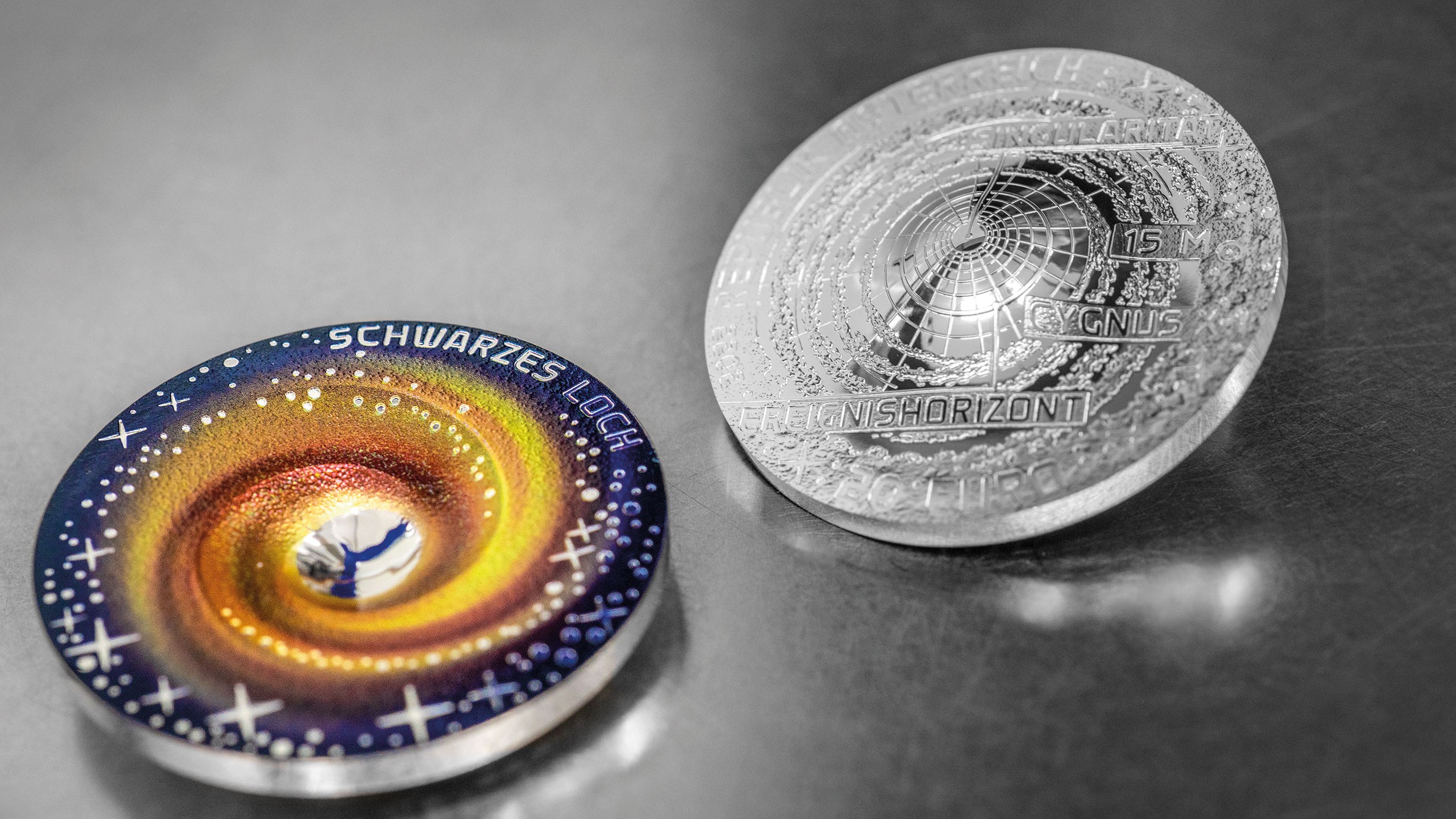 Collector coin A black hole lying on a silver table